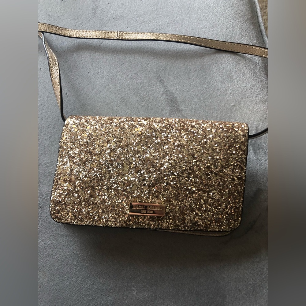 Henri Bendel wallet with straps